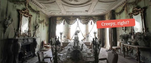 The discheveled dining room, covered in cob webs and dust.