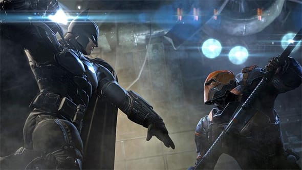 Batman fighting Deathstroke.