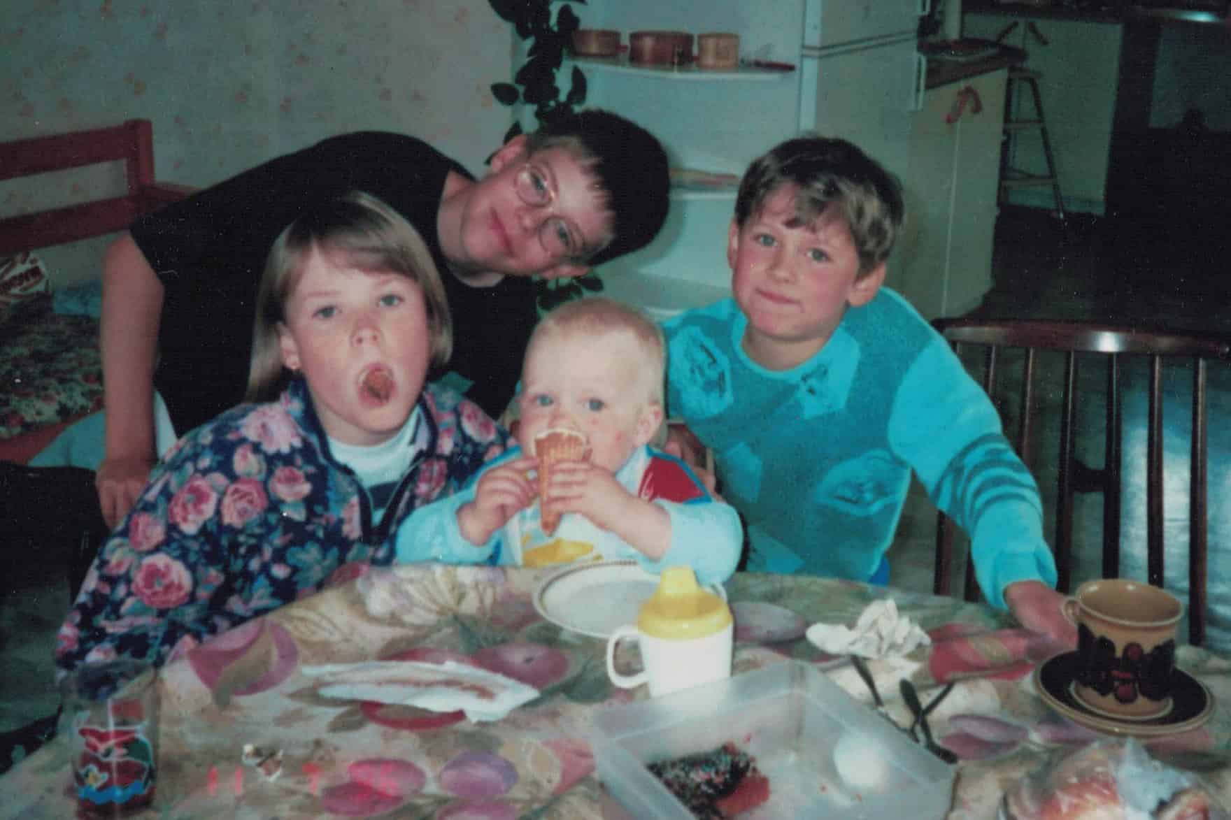 Carlos, most of his siblings and their cousin as a toddler eating ice cream, 1996.